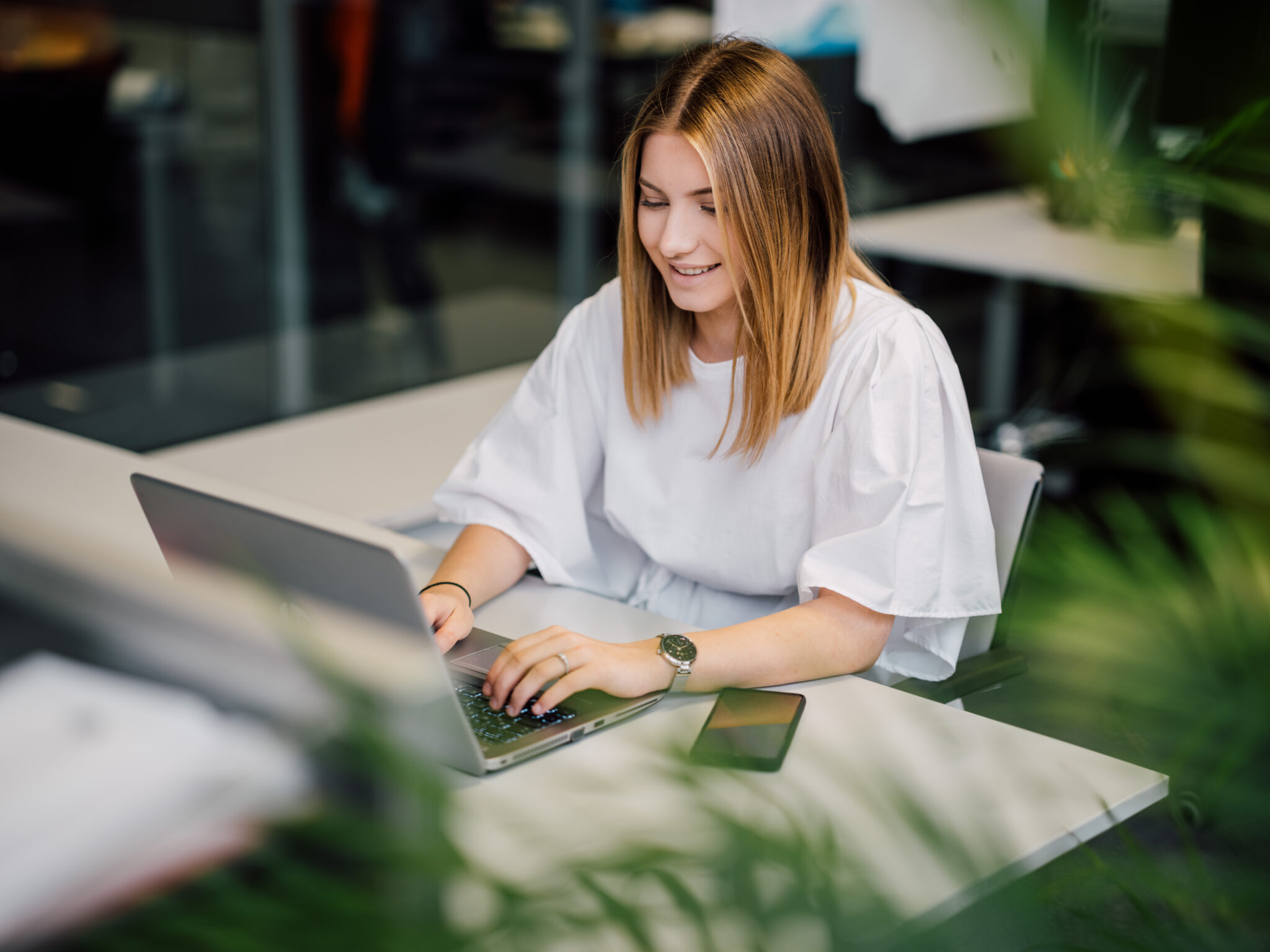 Professional woman working on laptop